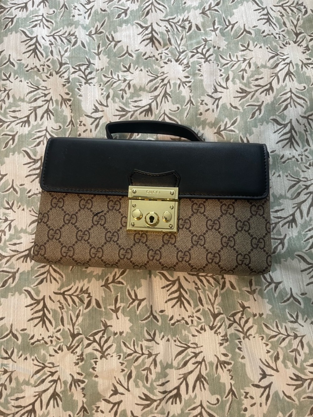 Brown GG Canvas Clutch with Black Leather Flap and Gold Hardware